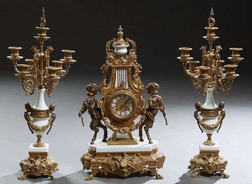 Louis XVI Style Ormolu Bronze and Marble Three Piece Mantel Clock Set, late 20th c., by Imperial, with a gilt bronze and marble urn surmount, over an 