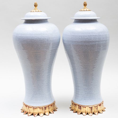 Pair of Contemporary Gilt-Metal and Giltwood Mounted Gray Crackle Glazed Pottery Baluster Vases and Covers
