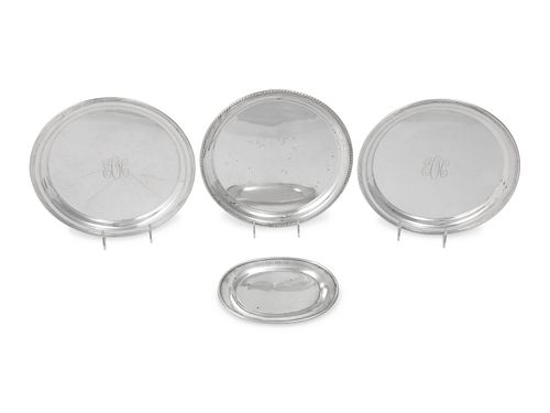 A Group of Four American Silver Platters