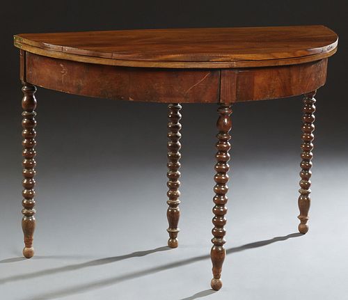 French Louis Philippe Carved Walnut Demilune Dining Table, 19th c., the hinged oval top over a wide skirt, on bobbin turned legs, H.- 29 3/8 in., W.- 