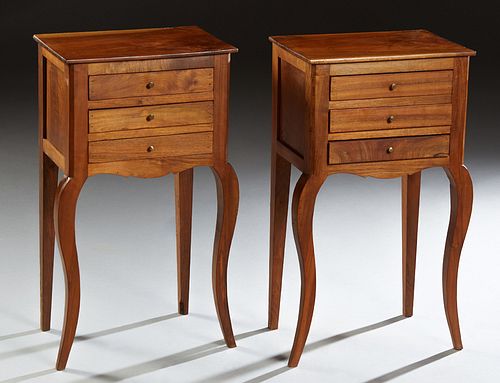 Pair of French Louis XV Style Carved Walnut Nightstands, early 20th c., the rectangular top over three drawers, on tapered cabriole legs, H.- 28 3/8 i