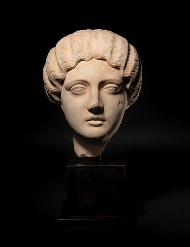 A Roman Marble Portrait Head of the Empress Faustina Minor
Height of marble 12 inches.