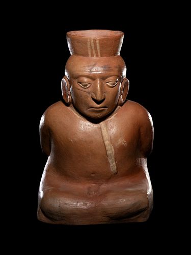 A Large Moche Terracotta Vessel Depicting a Bound Captive
Height 14 3/4 inches.