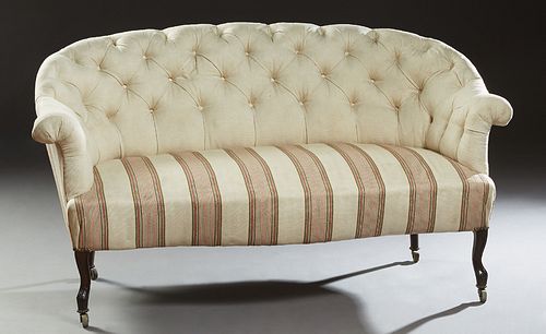 French Louis XV Style Carved Beech Settee, c. 1870, the curved arched tufted wraparound back and arms to a serpentine seat, on cabriole legs with cast