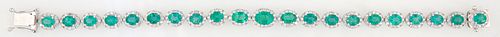 14K White Gold Link Bracelet, each of the 21 oval links with an oval emerald atop a border of small round diamond, total emerald wt.- 7.3 cts., total 