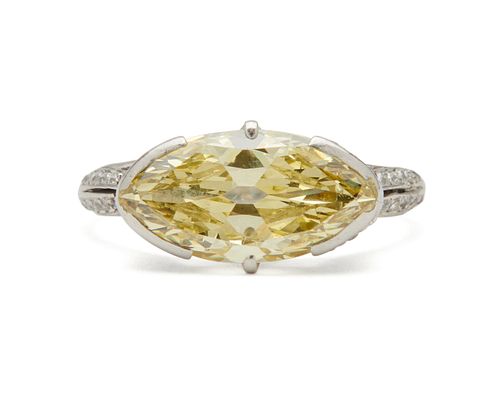Platinum, Fancy Intense Yellow Diamond, and Diamond Ring