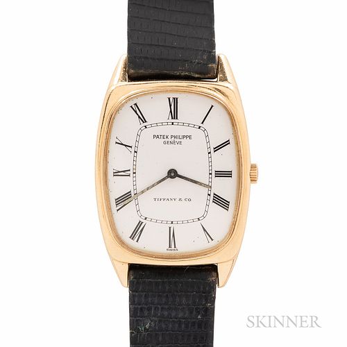 Tiffany & Co. Signed Patek Philippe 18kt Gold "Ellipse" Wristwatch, ivory roman numeral dial with stick hands and marked "Patek Philipp