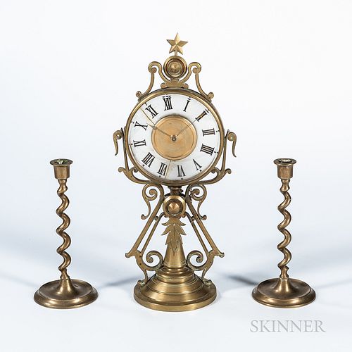 Unusual French Brass Candlestick Clock, last quarter 19th century, scroll-form brass case with a hinged 5 1/2-in. dia. bezel, opening t