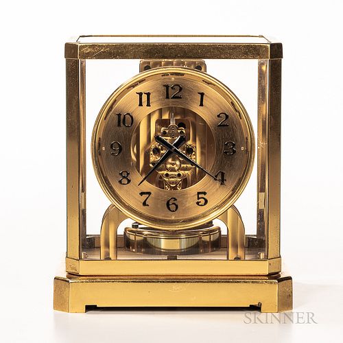 Jaeger-LeCoultre Co. Atmos Clock, no. 12077, 5-in. gilt dial with applied black arabic numerals and hands, 15-jewel movement powered by