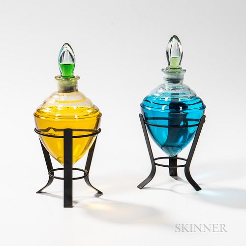 Pair of Colorless Glass Countertop Apothecary Show Globes, mounted to custom made iron stands, globe ht. 7 in.