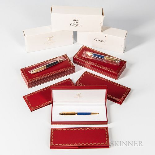 Three Cartier "Must de" Stylo "Panthere" Pens, two with blank guarantee cards and still retaining the unopened packaging, all with inne
