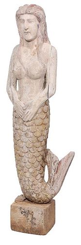 Carved and Polychromed Figure of a