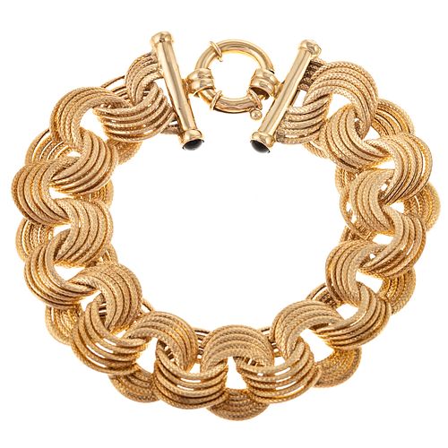 A Large Interlocking Link Bracelet in Gold
