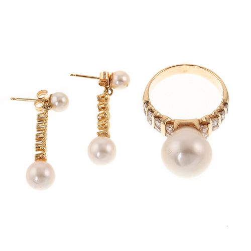 A Diamond & Pearl Ring & Earrings in 14K