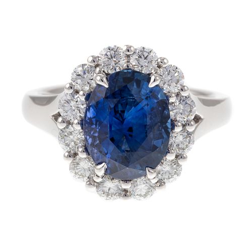 A 4.54 ct Sapphire & Diamond Halo Ring in Plat