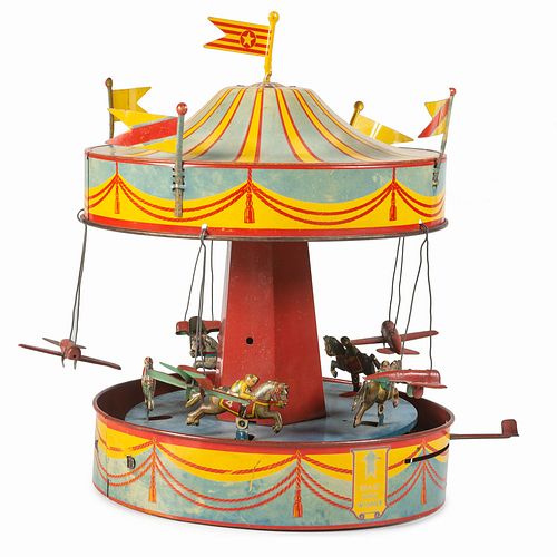A Tin Ring Winner Lever-Operated Carousel