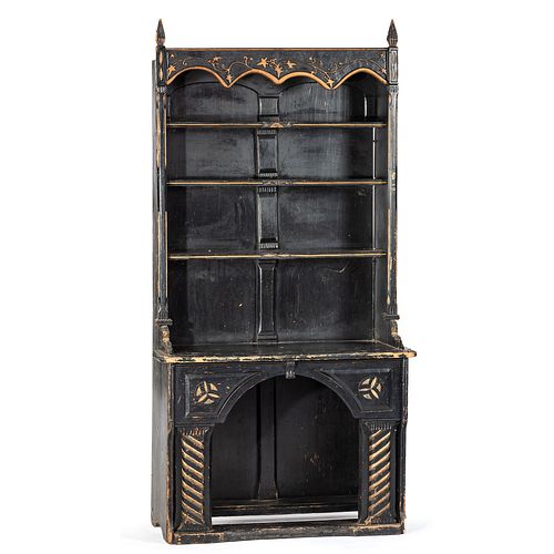 A Gothic Revival Carved, Gilt and Black Lacquered Cupboard