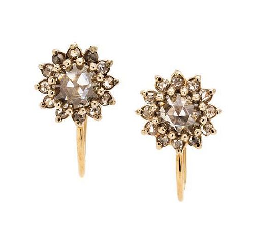 * A Pair of Yellow Gold and Diamond Earclips, 2.00 dwts.