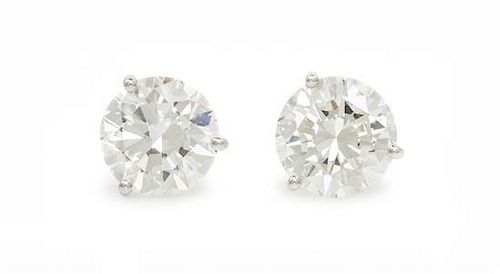 A Pair of White Gold and Diamond Stud Earrings, 2.80 dwts.