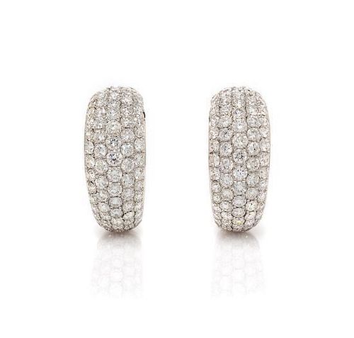 A Pair of 18 Karat White Gold and Diamond Hoop Earrings, 4.70 dwts.