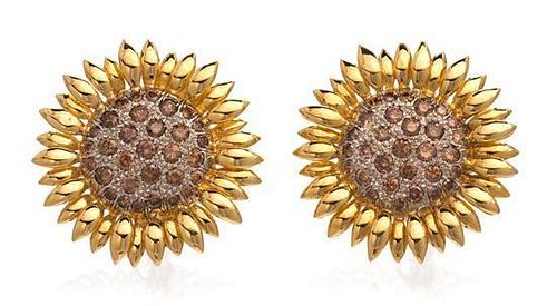 * A Pair of Gold and Colored Diamond Sunflower Motif Earclips, 17.70 dwts.