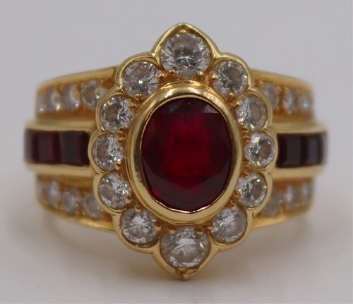 JEWELRY. 18kt Gold, Garnet and Diamond Ring.
