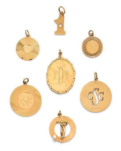 A Collection of Seven Loose 14 Karat Yellow Gold Charms, 23.00 dwts.