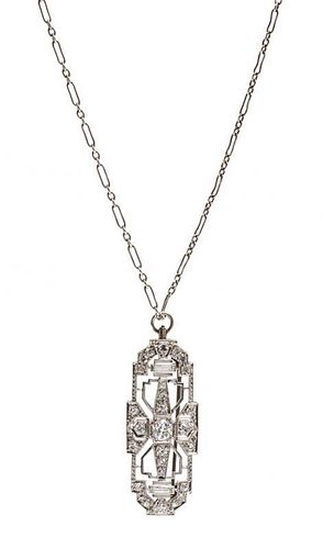 An Art Deco Platinum and Diamond Pendant/Brooch, 6.40 dwts.