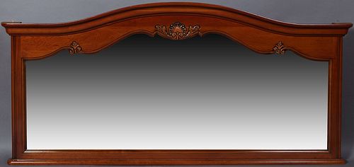 French Provincial Louis XV Style Carved Cherry Overmantle/Backbar Mirror, 20th c., the arched ogee frame with a central leaf and shell carving, over a