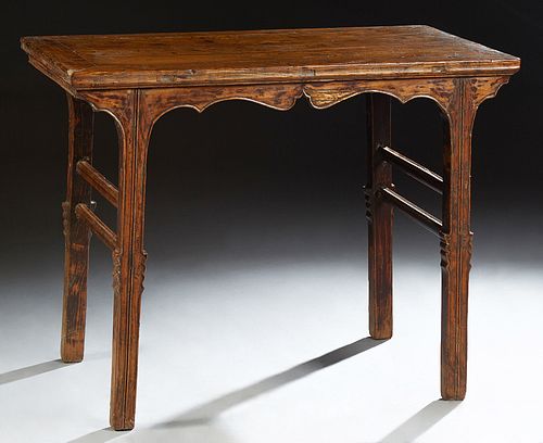 Chinese Carved Elm Altar Table, early 20th c., the rectangular top over a scalloped skirt on two sides, on reeded "sword" legs, H.- 33 in., W.- 43 in.