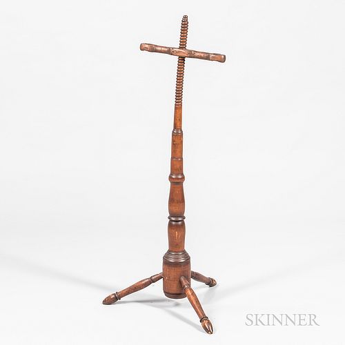 Cherry and Oak Adjustable Lightstand, possibly Connecticut, 18th century, the double candle arm on a turned shaft and tripod base, ht.