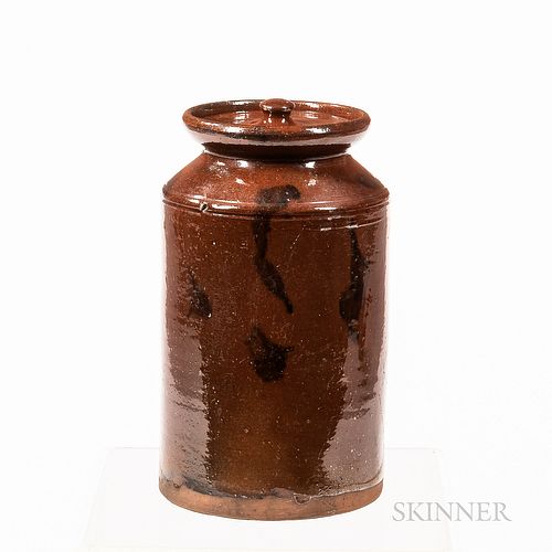 Straight-sided Redware Covered Jar, New England, mid-19th century, with flared collar, manganese splotch decoration, (repairs to rim, l
