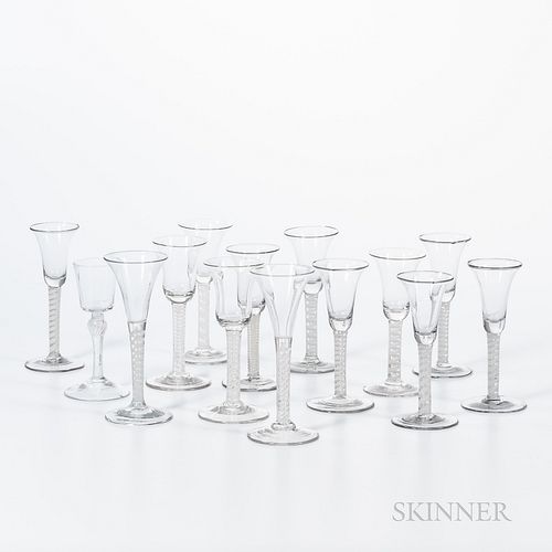 Fourteen Early Blown Wineglasses, early 19th century, all with cottontwist stems, most with trumpet-form and some with bell-form bowls,