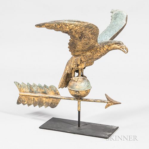 Molded Copper Eagle Weathervane, with wings spread, on a belted ball and arrow directional, original gilt and verdigris surface, ht. 21