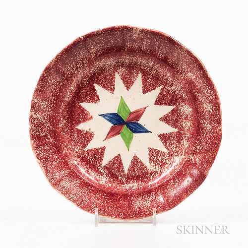 Red Spatterware "Star" Pattern Plate, England, 19th century, the plate with paneled rim and allover red spatter centering a twelve-poin