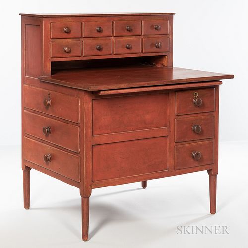 Shaker Red-painted Sewing Desk, probably Enfield, New Hampshire, c. 1845, the case of fourteen drawers: eleven on the front, with a pul