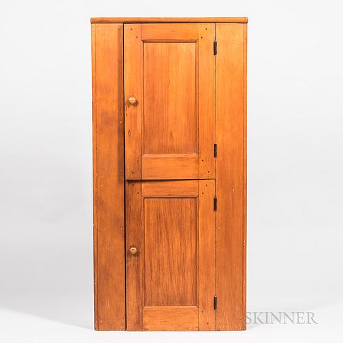 Shaker Pine Two-door Hanging Cupboard, Enfield, Connecticut, c. 1830, with quarter-round molding surrounding the door panels opening to
