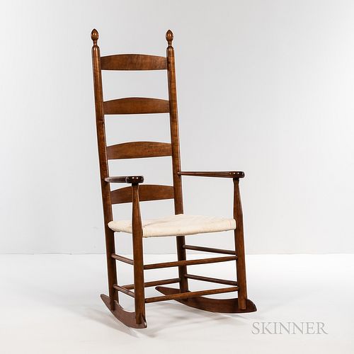Shaker Figured Maple Armed Rocking Chair, New Lebanon, New York, c. 1850, refinished, (repair to stiles), ht. 45 3/4, seat ht. 16 in. P
