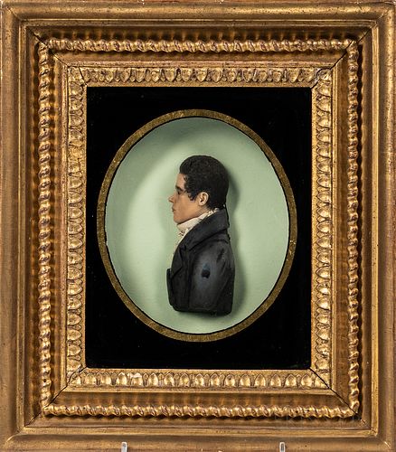 Painted Molded Wax Portrait of a Young Gentleman, probably England, early 19th century, profile view of the dark-haired subject behind