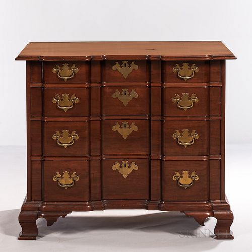Chippendale Carved Mahogany Block-front Chest of Drawers, probably Boston, Massachusetts, c. 1760-80, the molded top on a cockbeaded ca