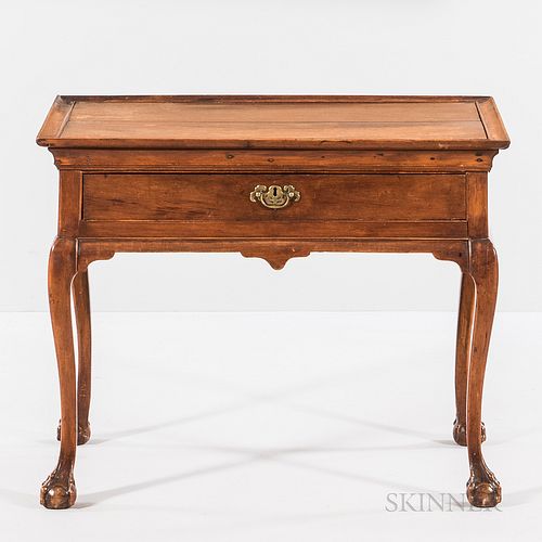 Chippendale Cedar and Walnut Tea Table, Bermuda, last half 18th century, the tray top with molded edge above a cockbeaded and rolled cu