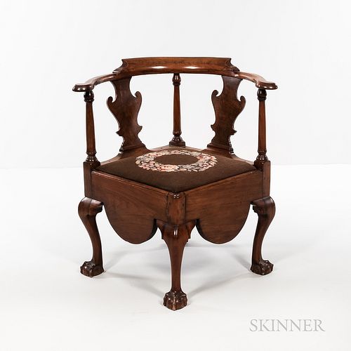 Chippendale Carved Mahogany Chamber Chair, New York, c. 1760-80, the shaped crest rail and scrolled arms above vasiform splats and turn