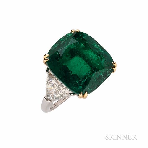 Pederzani Emerald and Diamond Ring, Milan, set with a cushion modified brilliant-cut emerald weighing 11.62 cts., flanked by trillion-c