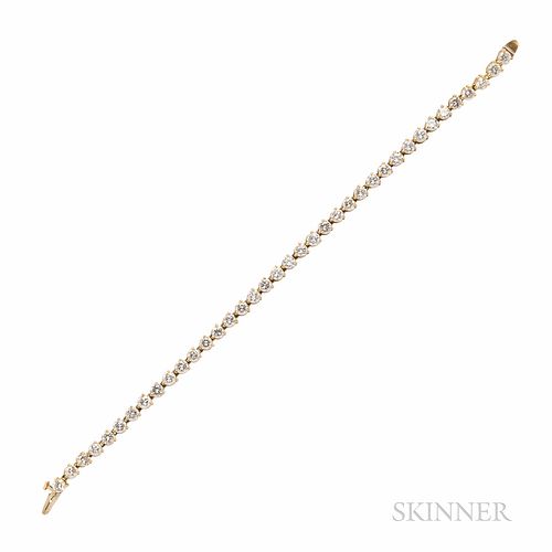 18kt Gold and Diamond Line Bracelet, set with thirty-eight full-cut diamonds, approx. total wt. 6.50 cts., 6.8 dwt, lg. 6 7/8 in.