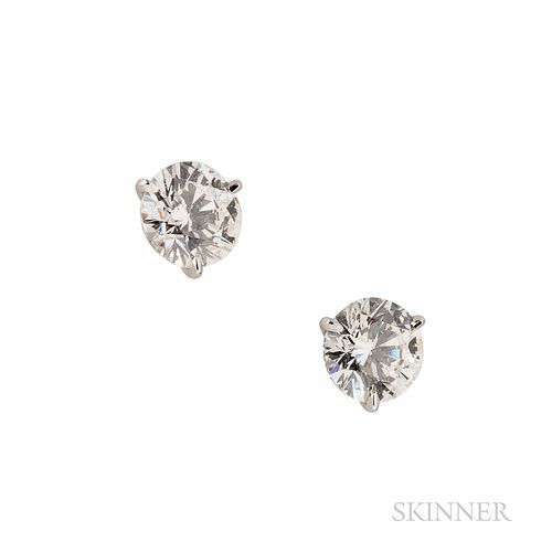 Platinum and Diamond Earstuds, the round brilliant-cut diamonds weighing 2.01 and 2.02 cts. Note: Accompanied by GIA report no. 1159618