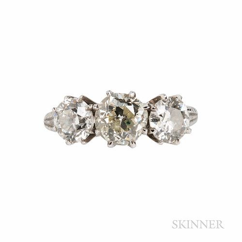 Platinum and Diamond Ring, Mounted by Harry Winston, set with three old European-cut diamonds weighing approx. 1.15, 0.70, and 0.60 cts
