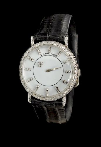 * An 18 Karat White Gold and Diamond Ref. 167B Mystery Wristwatch, Longines,