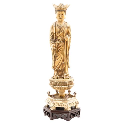 KUAN-YIN, CHINA, 20th century, Ivory carving, decorated in black ink, wooden base, 16.7" (42.5 cm)