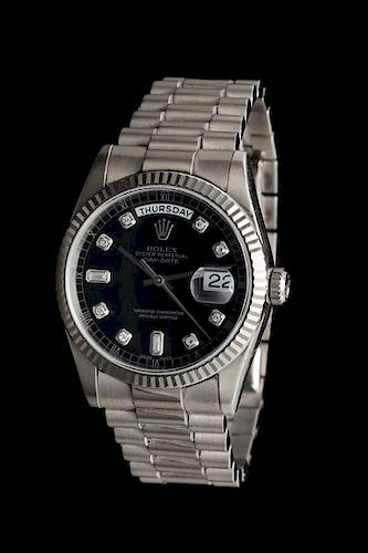 An 18 Karat White Gold and Diamond Ref. 118239 Oyster Perpetual Day-Date Wristwatch, Rolex, Circa 2001,
