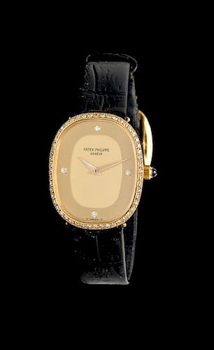 An 18 Karat Yellow Gold and Diamond Ref. 4282 Ellipse Wristwatch, Patek Philippe,
